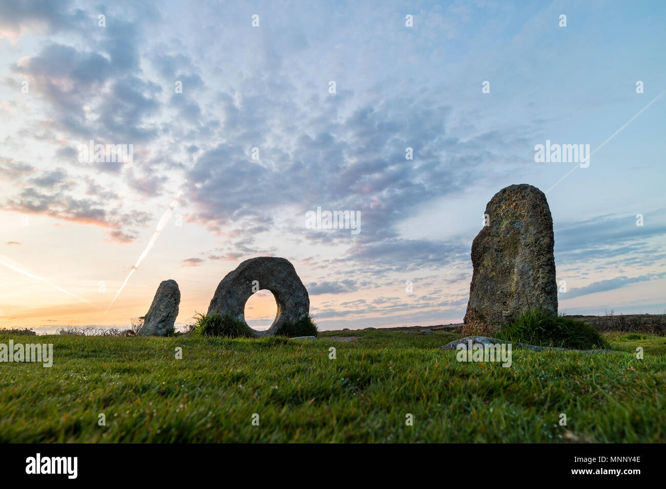 Dawn Light Illuminating the Men-an-Tol Standing Stones Near Madron, Cornwall, UK Stock Photo