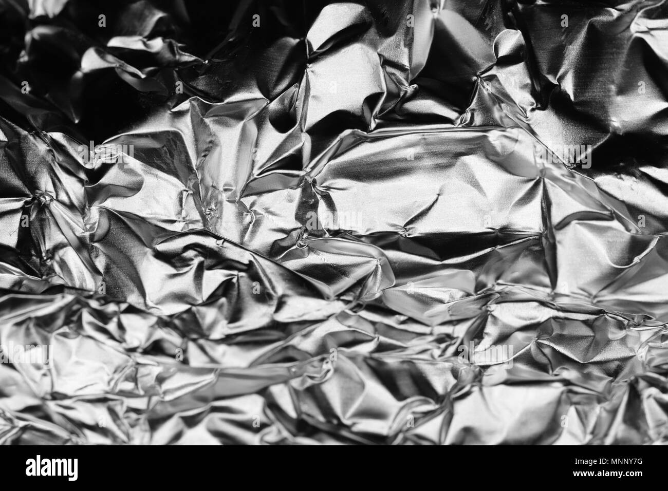 Monochrome Crumpled Foil Texture Background Stock Photo