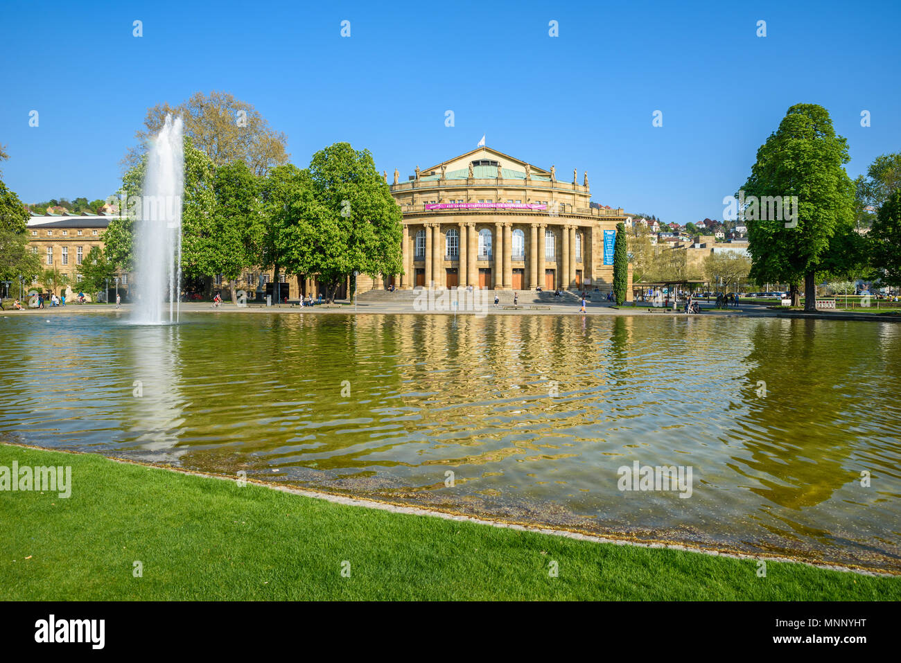 Stuttgart State Theatre Opera building and fountain in Eckensee lake, Germany Stock Photo