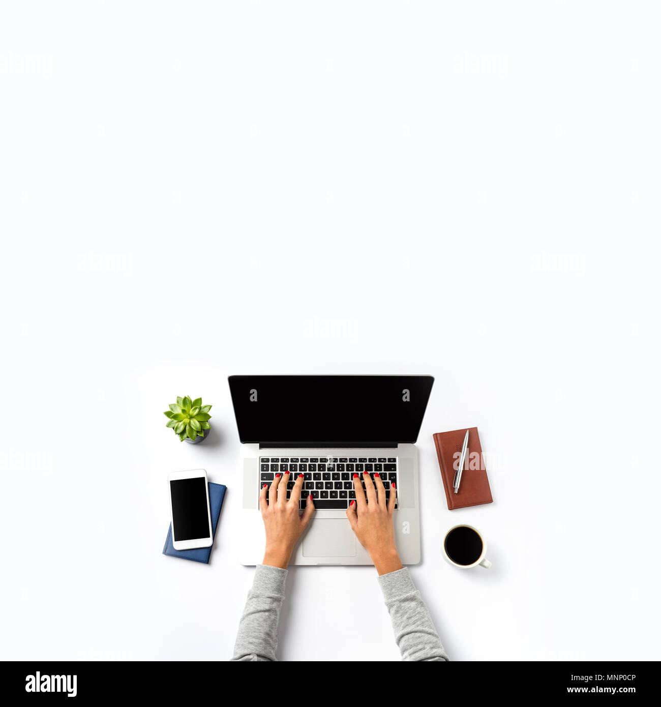 Office desktop with laptop and accessories Stock Photo