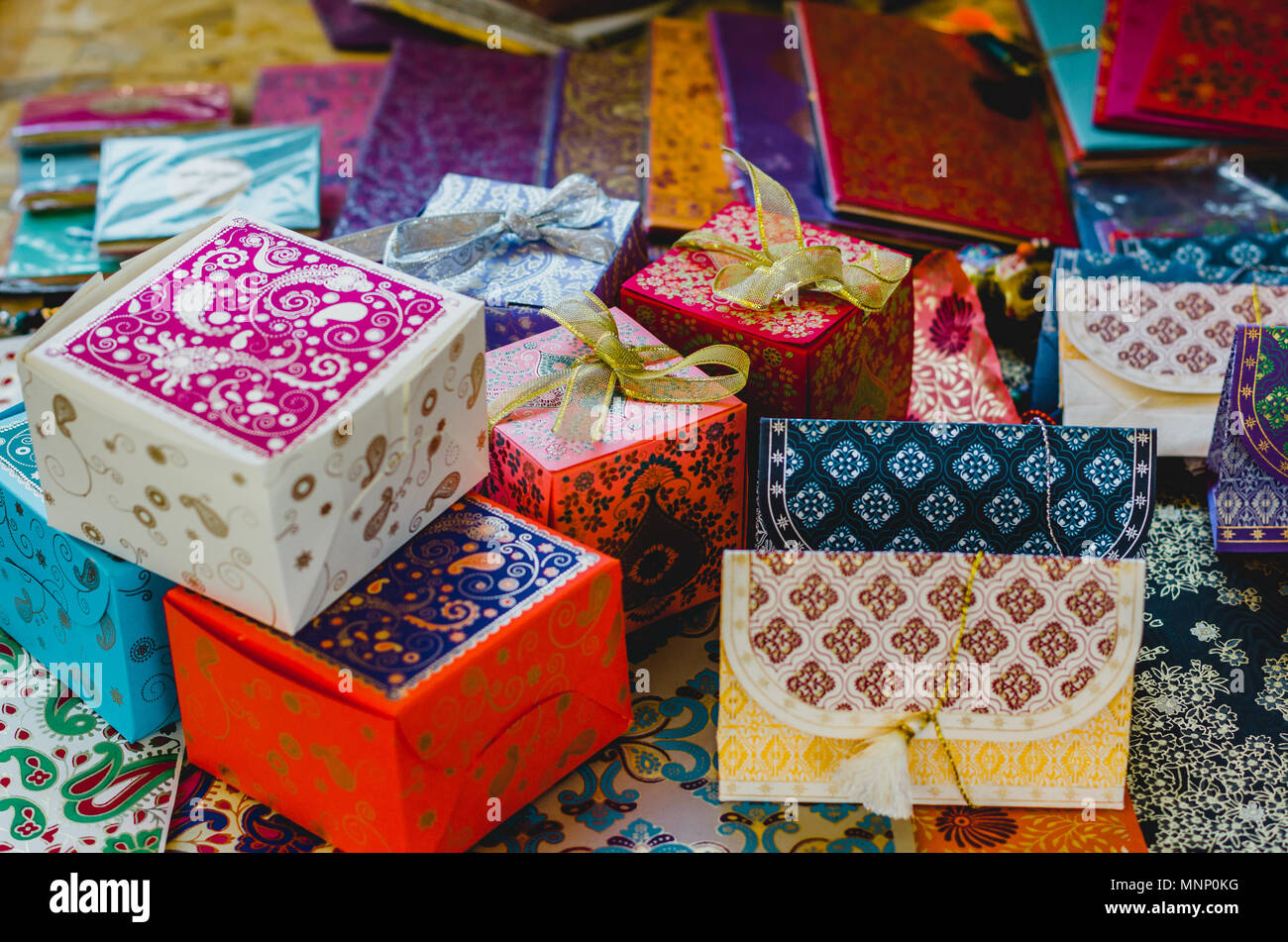 Colorful oriental gift boxes with ribbons Stock Photo