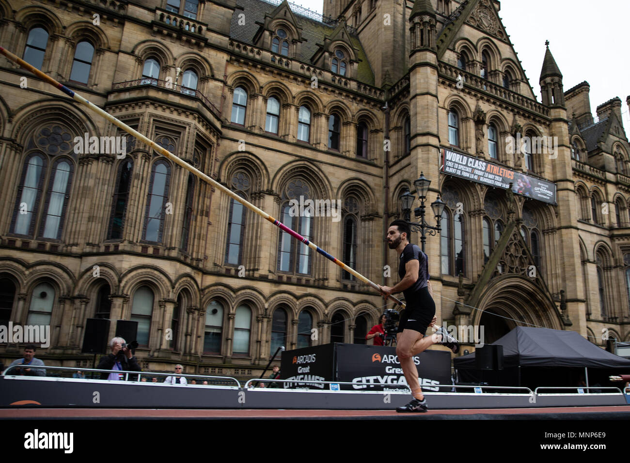 Deansgate, Manchester, UK. 18th May, 2018. The Arcadis Great CityGames, Manchester; Jorge Urena outside Manchester Town Hall during the mens pole vault Credit: Action Plus Sports/Alamy Live News Stock Photo