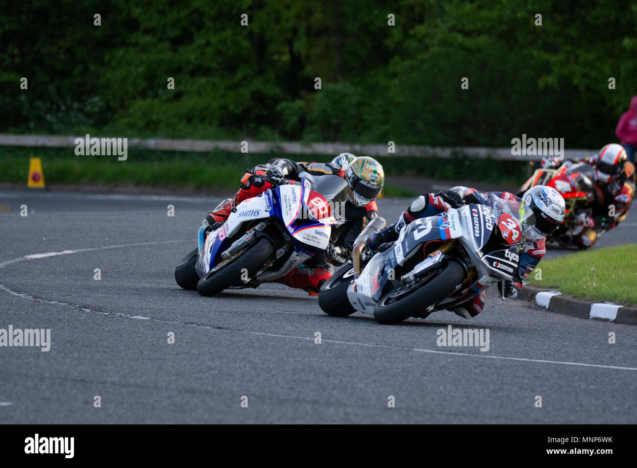 Ballysally Roundabout Coleraine Northern Ireland. 17th May 2018. NW 200 Bayview Superstock Race. Alister Seeley (34) Leads  Peter Hickman (60) through Ballysally Roundabout with Michael Rutter (4) chasing Credit: Brian Wilkinson/Alamy Live News Stock Photo