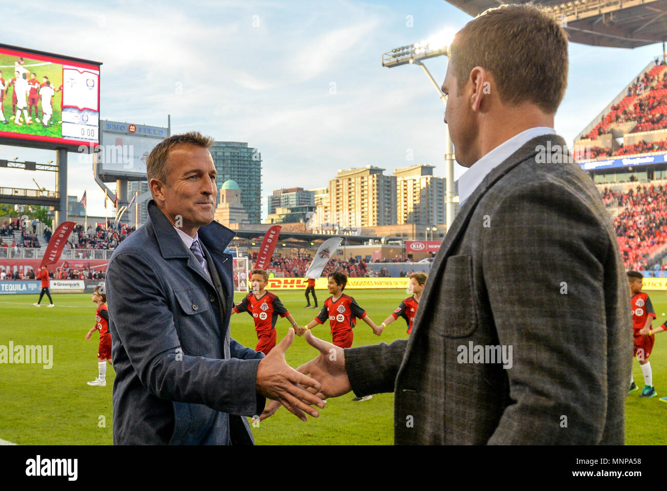 Jason Kreis (L) greeting with Greg Vanney (R) before the 2018 MLS Regular Season match between Toronto FC (Canada) and  Orlando City SC (USA) at BMO Field (Score 2:1) Stock Photo