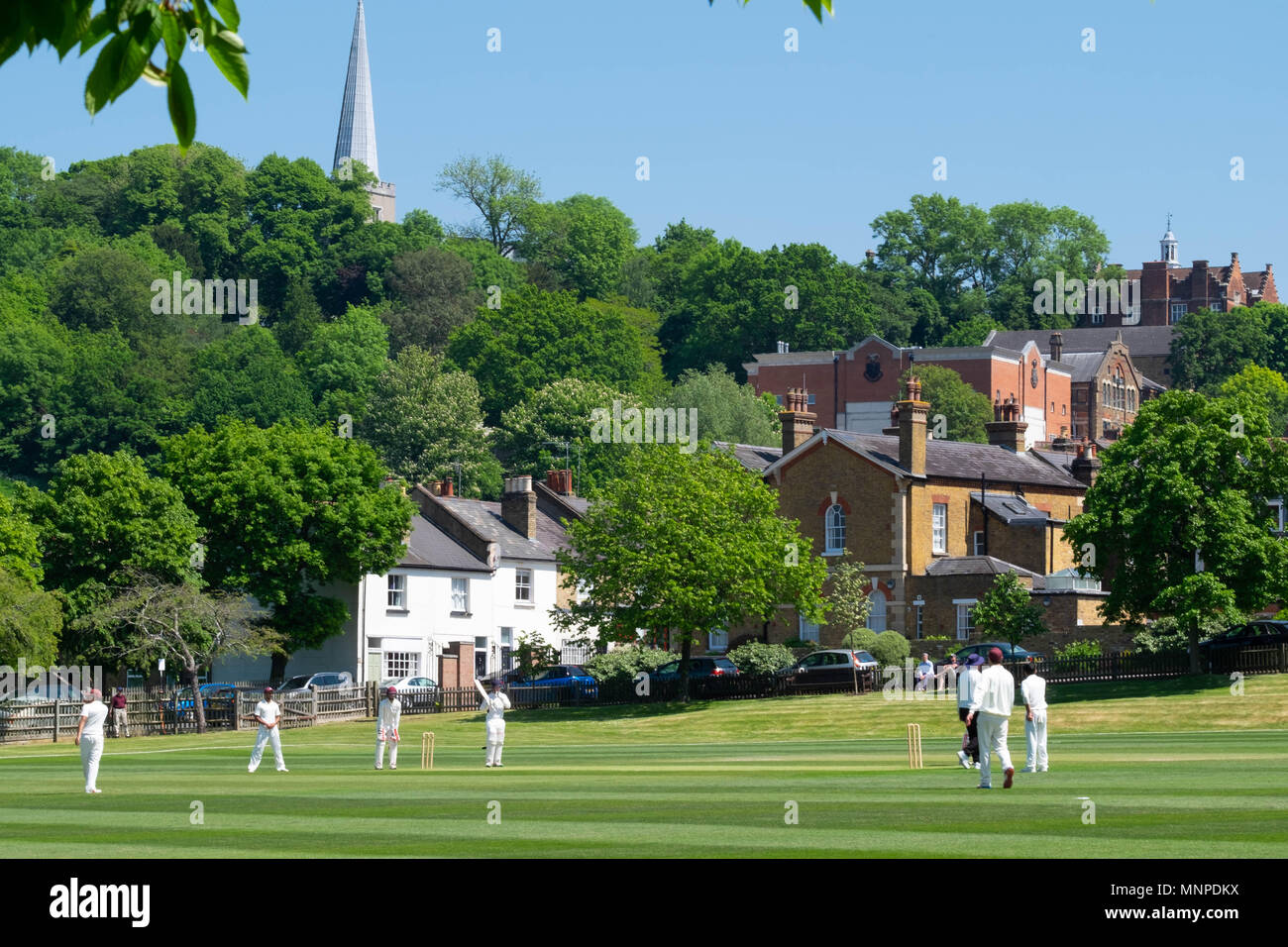 Harrow, London, England, 19th May 2018.  A cricket match is underway on the slopes of Harrow-on-the-Hill on a beautiful spring Saturday © Tim Ring/Alamy Live News Stock Photo