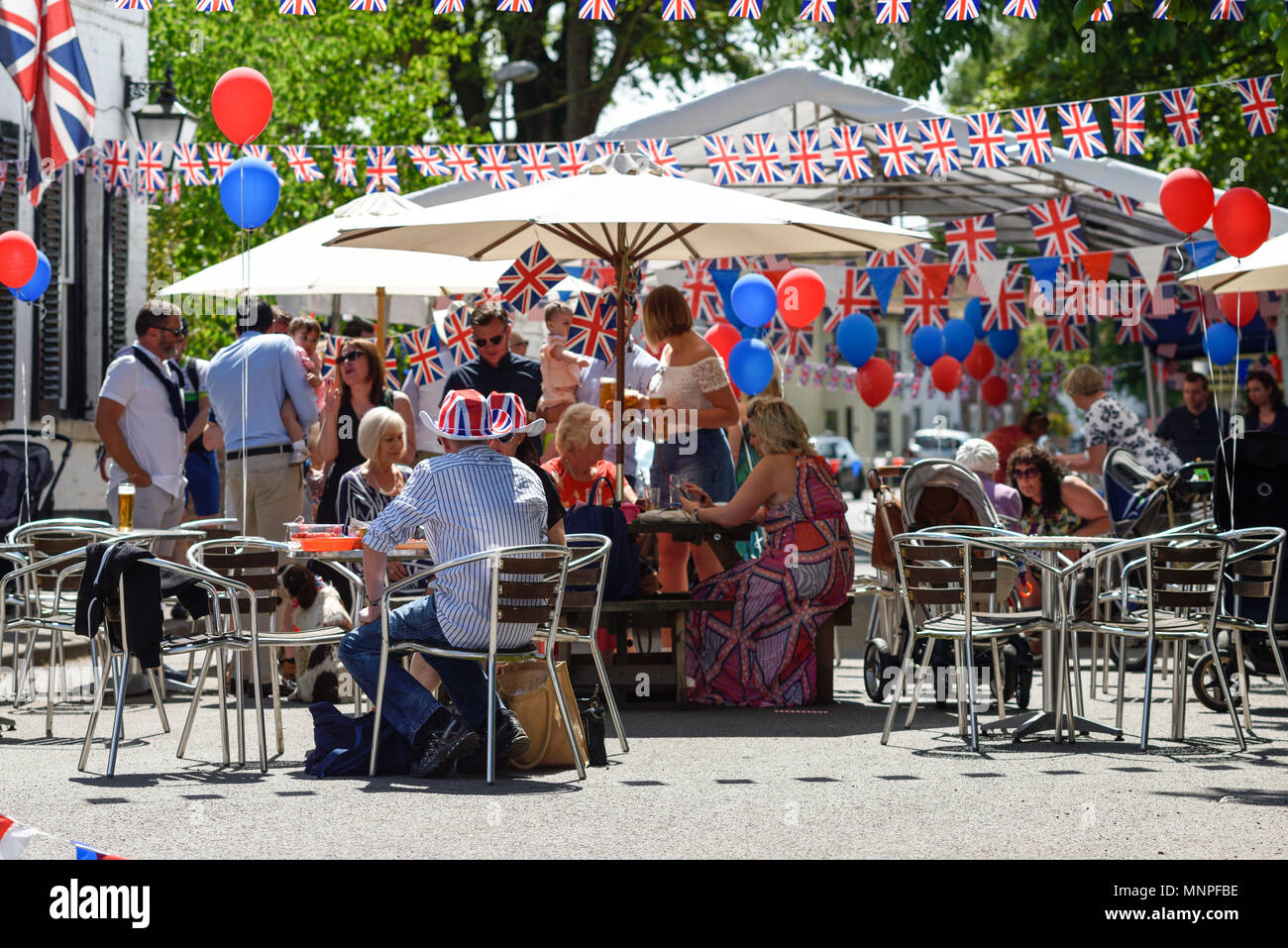 Orston, Nottinghamshire, UK: 19th May 2018. Villagers in the Nottinghamshire village of Orston celebrate with a street party and church service the royal wedding of Prince Harry and Meghan Markle. Credit: Ian Francis/Alamy Live News Credit: Ian Francis/Alamy Live News Stock Photo