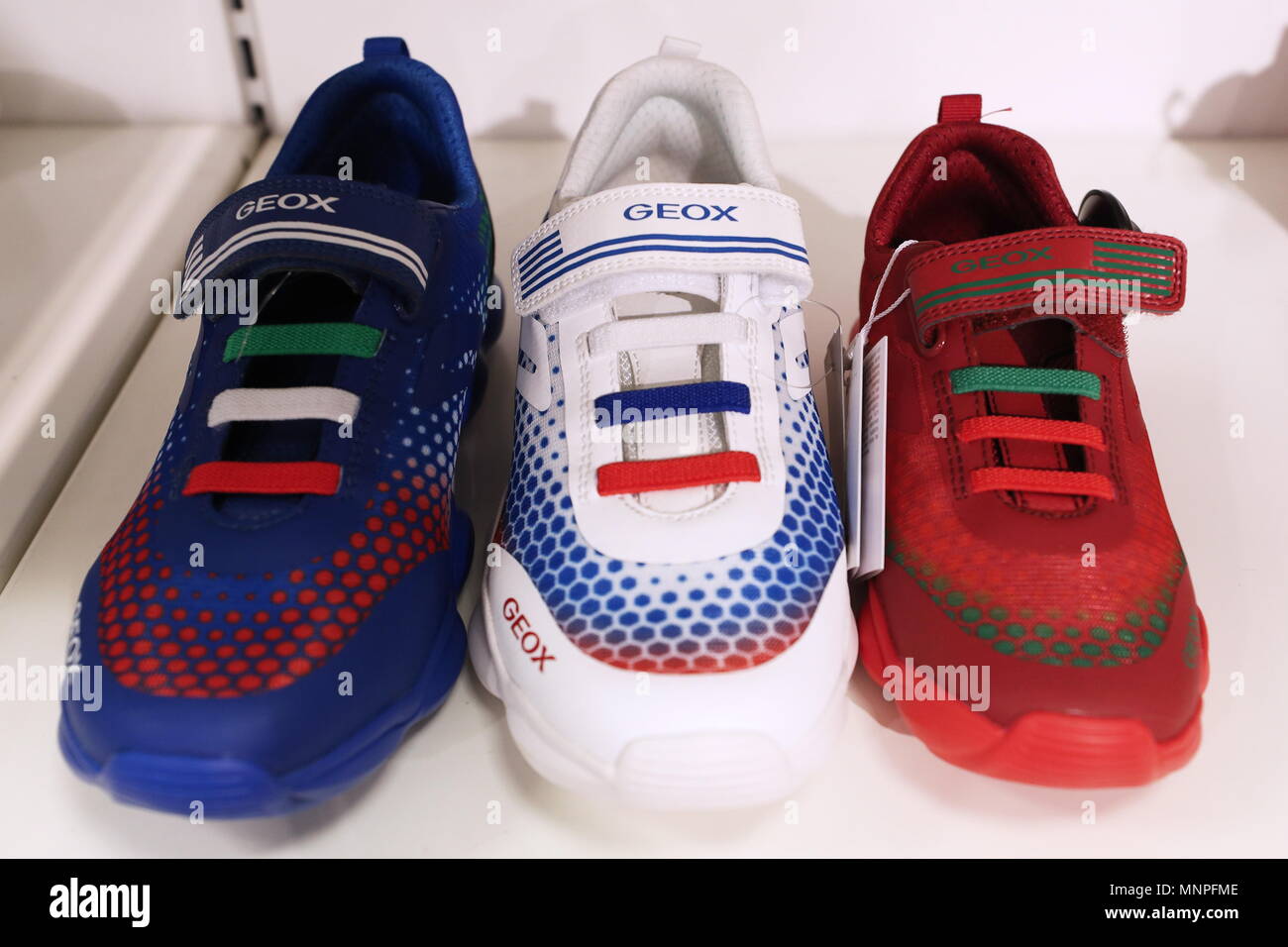 Moscow, Russia. 19th May, 2018. MOSCOW, RUSSIA - MAY 19, 2018: Children's  trainers in colours of 2018 FIFA World Cup teams - Italy, Spain, Brazil,  the United Kingdom, Germany and Russia -