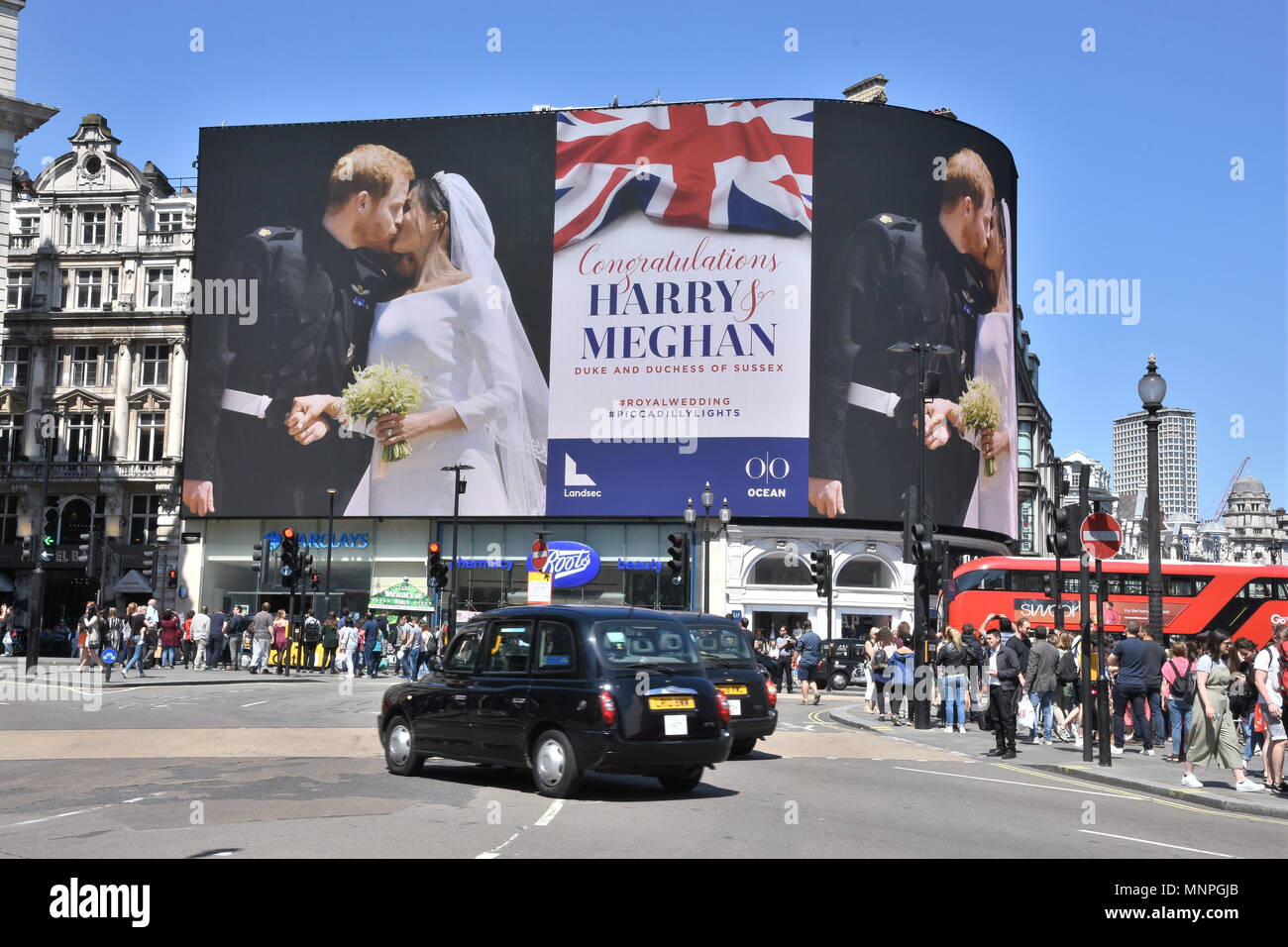 A picture of Prince Harry and Meghan Markle's Wedding in Windsor was displayed on the electronic billboard in Piccadilly Circus, Piccadilly, London. UK 19.05.2018 Credit: michael melia/Alamy Live News Stock Photo