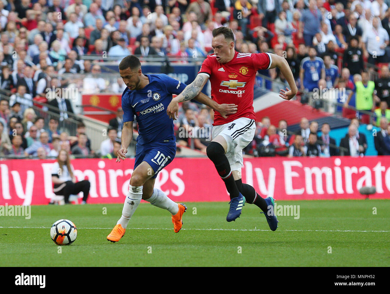London, UK, 19 May 2018.   Eden Hazard of Chelsea is fouled by Phil Jones of Manchester United and wins a penalty during the FA Cup Final match between Chelsea and Manchester United at Wembley Stadium on May 19th 2018 in London, England. (Photo by Paul Chesterton/phcimages.com) Credit: PHC Images/Alamy Live News Credit: PHC Images/Alamy Live News Stock Photo
