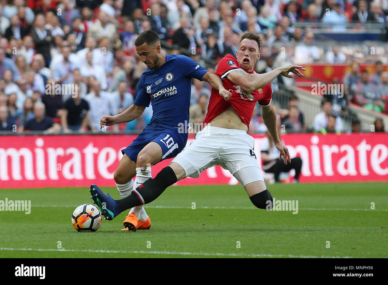 London, UK, 19 May 2018.   Eden Hazard of Chelsea is fouled by Phil Jones of Manchester United and wins a penalty during the FA Cup Final match between Chelsea and Manchester United at Wembley Stadium on May 19th 2018 in London, England. (Photo by Paul Chesterton/phcimages.com) Credit: PHC Images/Alamy Live News Credit: PHC Images/Alamy Live News Stock Photo