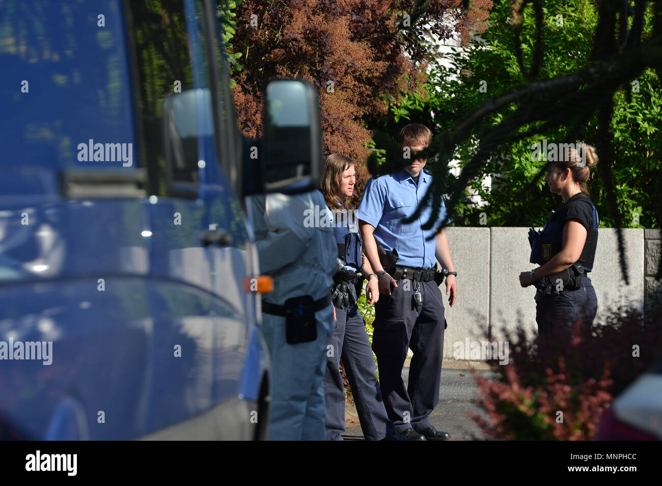 Saarbruecken, Germany, 19 May 2018. aarbruecken, Germany, 19 May 2018. 19 May 2018, Two policemen stand in a house in the district of Brebach-Fechingen, where two men were shot dead and two women were injured. The press speaker of the police reports that the suspect was caught. Photo: Harald Tittel/dpa Credit: dpa picture alliance/Alamy Live News Credit: dpa picture alliance/Alamy Live News Stock Photo