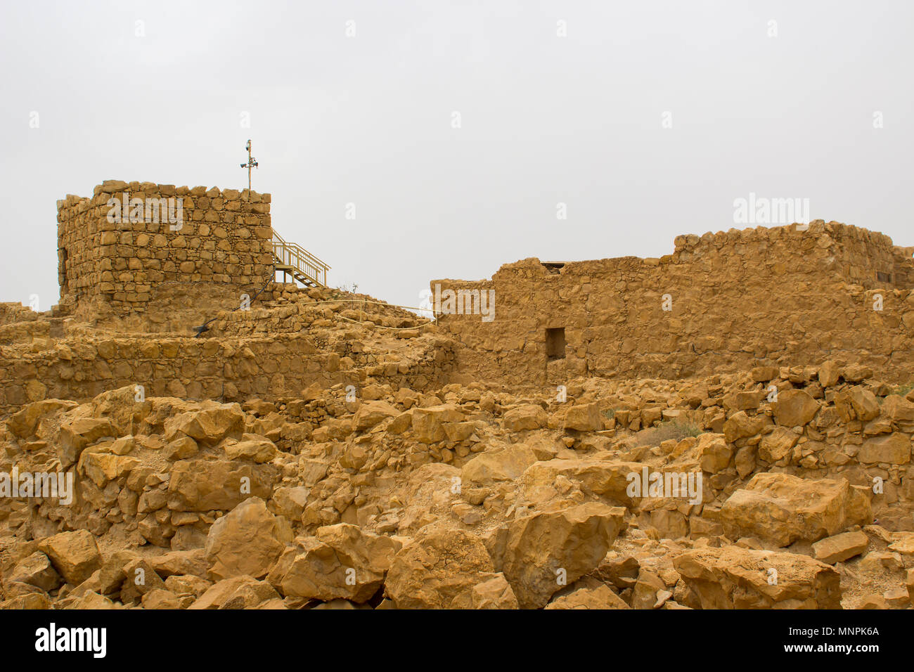 Some of the reconstructed ruins of the ancient Jewish clifftop fortress of Masada in Southern Israel.  This was the scene of an historic mass suicide. Stock Photo