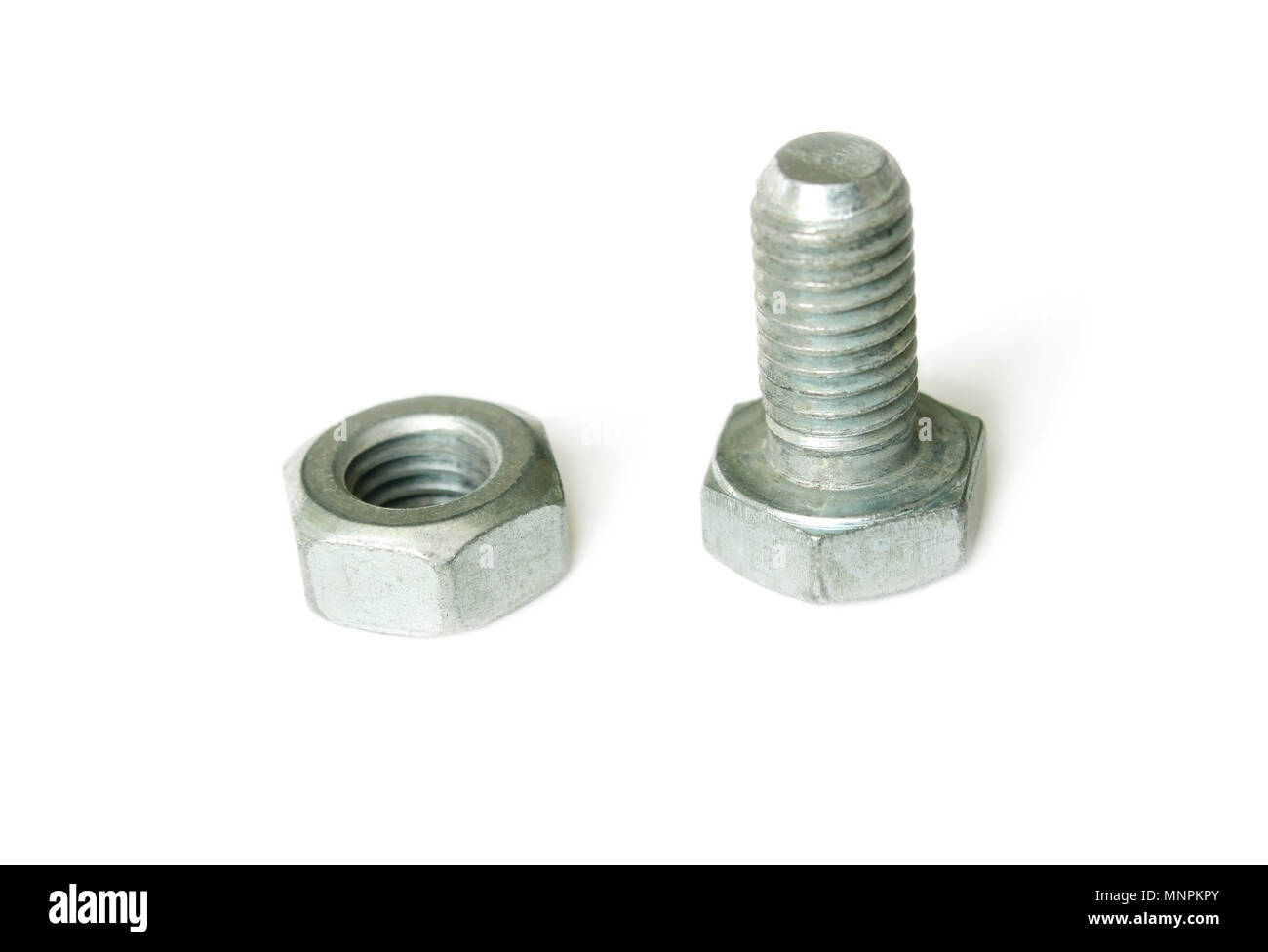 Bolt and nut isolated on a white background Stock Photo - Alamy