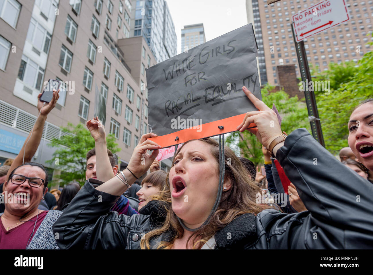 New York, USA. 18th May, 2018. Activists held a fiesta outside racist Aaron  Schlossberg's Midtown apartment on May 18, 2018. Manhattan lawyer Aaron  Schlossberg's racist rant against Spanish-speaking workers was caught on