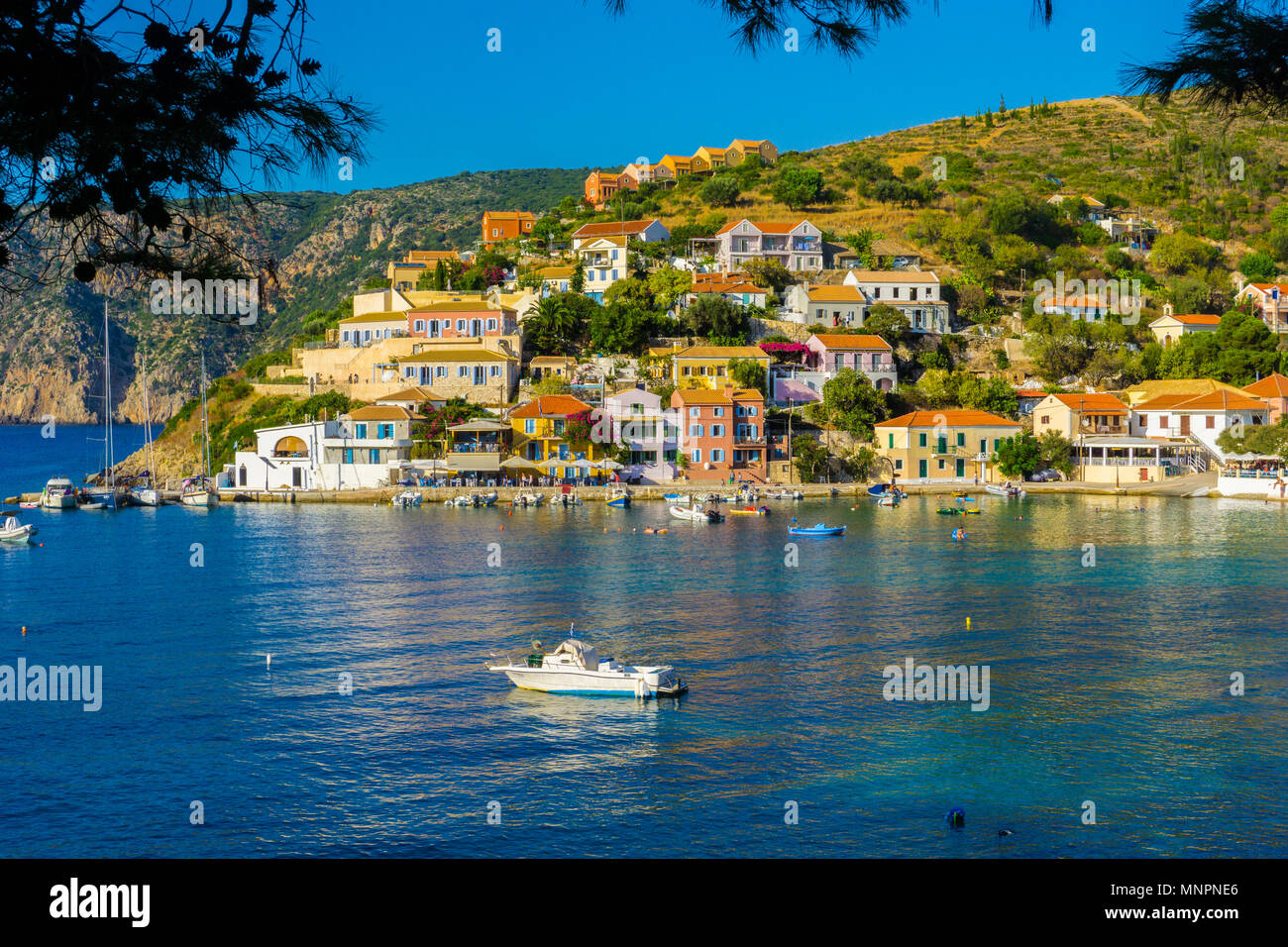 Assos village Mediterranean Sea, Greece. Summer vacation on Greek Island.  by Igor Tichonow. Photo stock - StudioNow