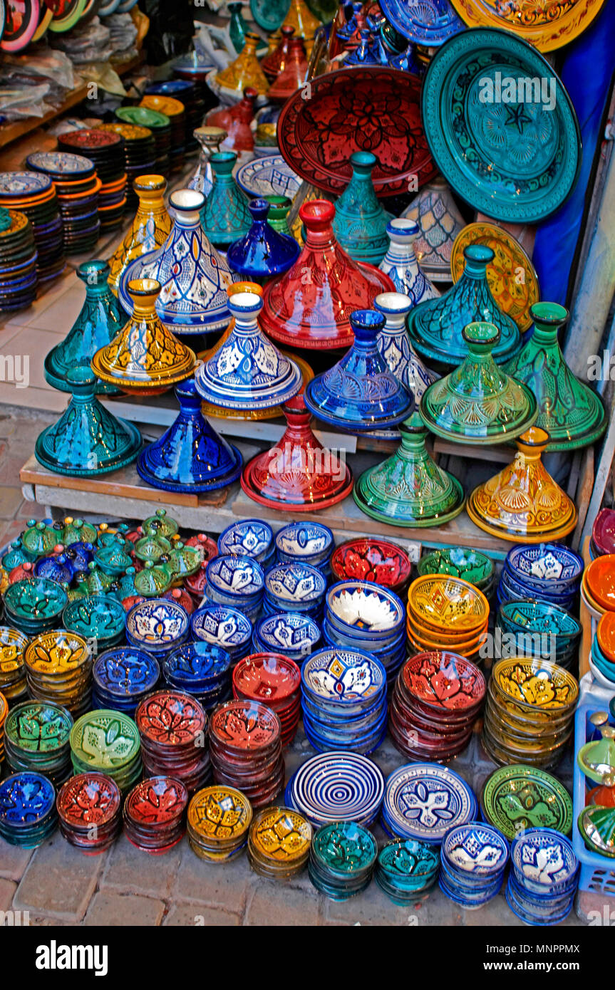 A display of traditioal decorated pottery In the Souk the Street Market at Jemaa el Fnaa in the Medina Old City in the centre of Marrakech in Morocco. Stock Photo