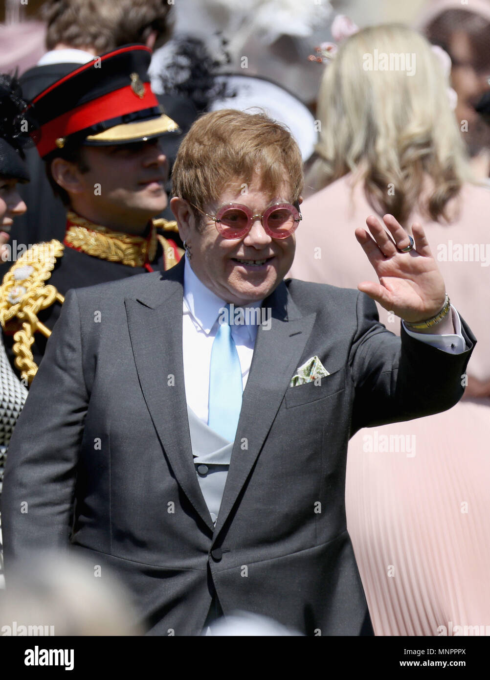 WINDSOR, ENGLAND - MAY 19: Sir Elton John arrives at the wedding of Prince Harry to Ms Meghan Markle at St George's Chapel, Windsor Castle on May 19, 2018 in Windsor, England. Prince Henry Charles Albert David of Wales marries Ms. Meghan Markle in a service at St George's Chapel inside the grounds of Windsor Castle. Among the guests were 2200 members of the public, the royal family and Ms. Markle's Mother Doria Ragland. (Photo by Chris Jackson/Getty Images) Stock Photo
