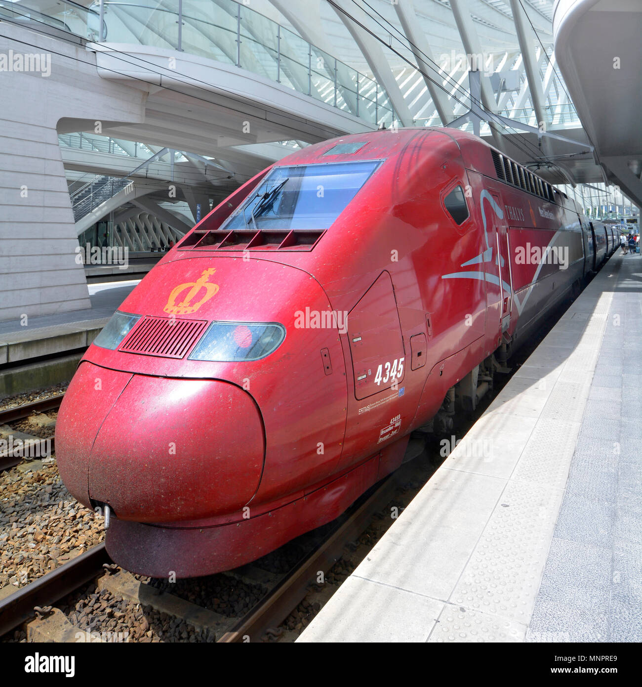 Aerodynamics on public transport SNCF TGV Thalys PBKA aerodynamic electric locomotive high speed passenger train at Liege Belgium EU railway station Stock Photo