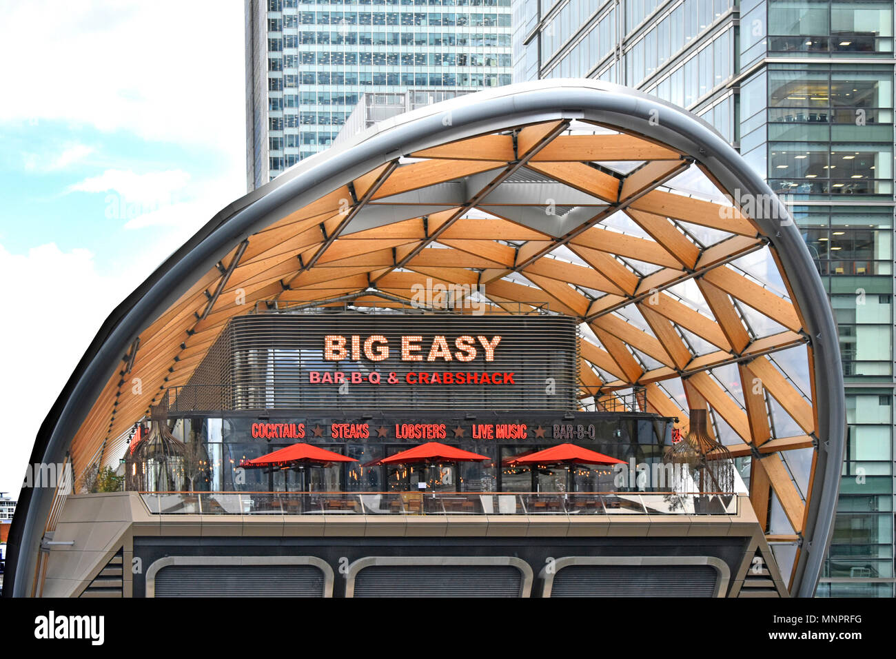 Big Easy restaurant end of Canary Wharf Crossrail Place roof garden modern architecture building West India Docks Isle of Dogs East London England UK Stock Photo