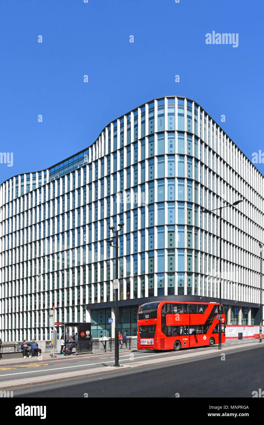 Bus stop outside new Wells Fargo Bank & Financial Services  business new build landmark office block facade European Headquarters City of London UK Stock Photo