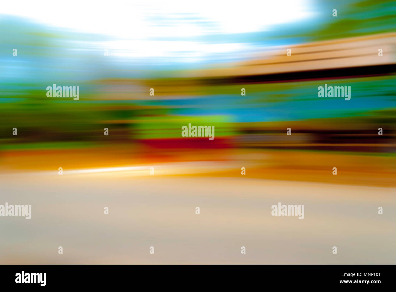Abstract unrealistic colorful background, horizontal motion blur simulating speed. Copy space. Stock Photo