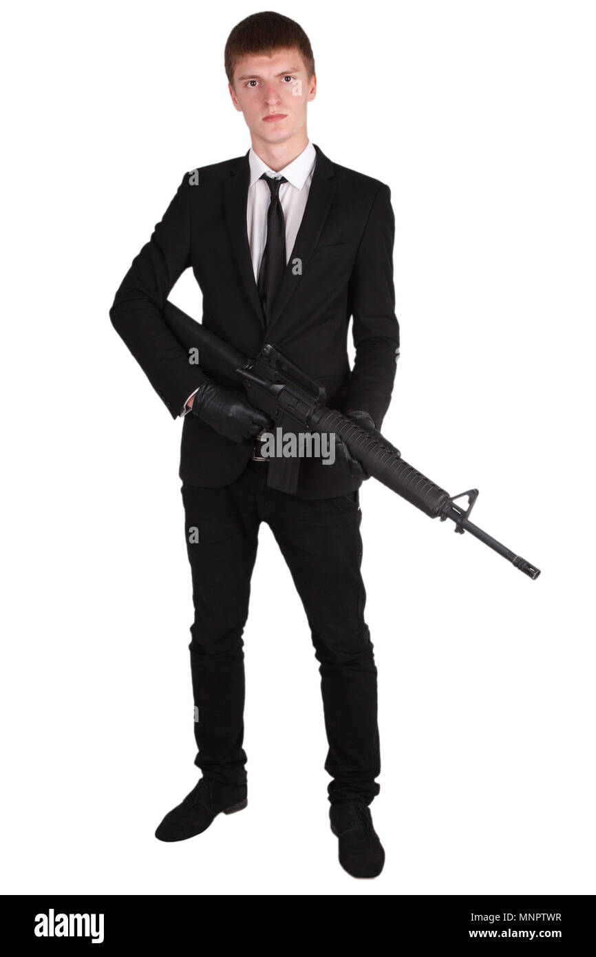 Man in suit with rifle isolated on white Stock Photo Alamy