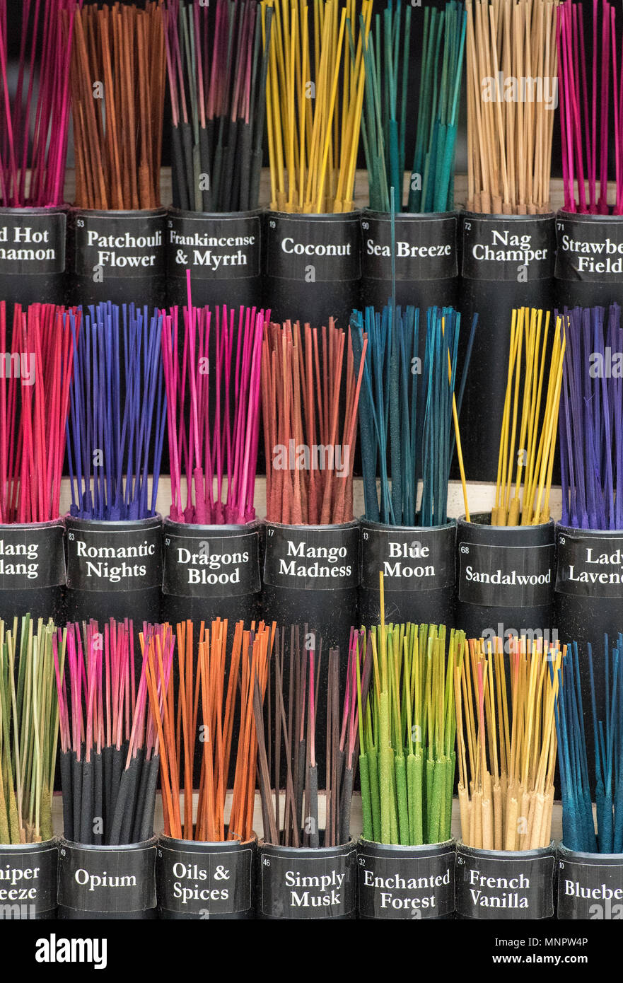 a brightly coloured selection of differently scented joss sticks used