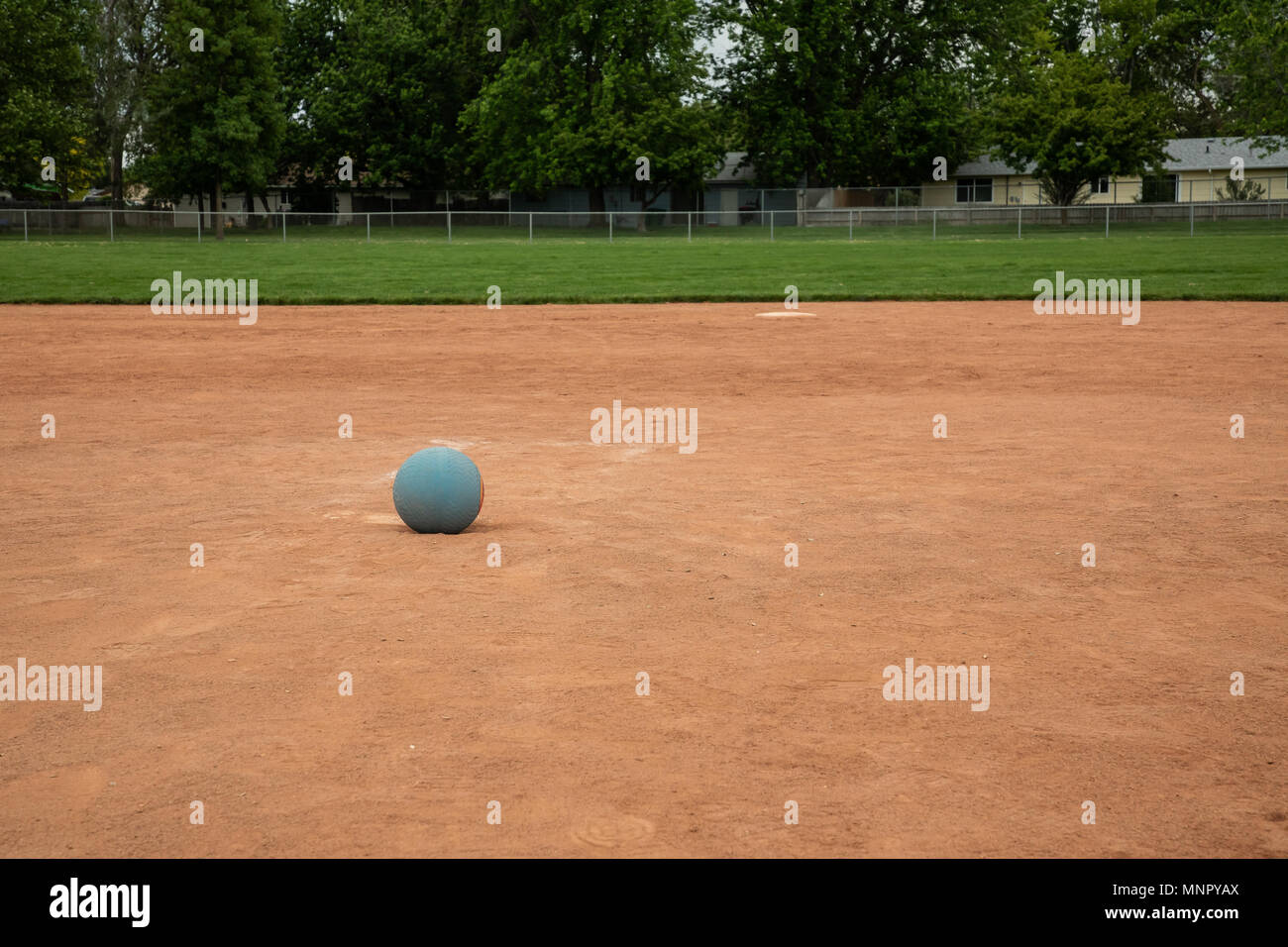 Kickball in the park with my friends Stock Photo