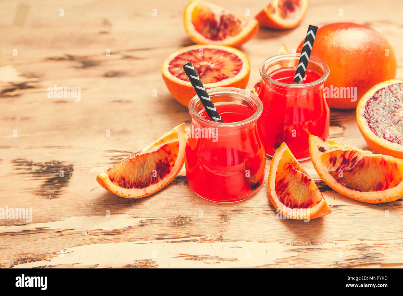 blood orange juice. red orange juice with orange slice. Healthy drink. Stock Photo
