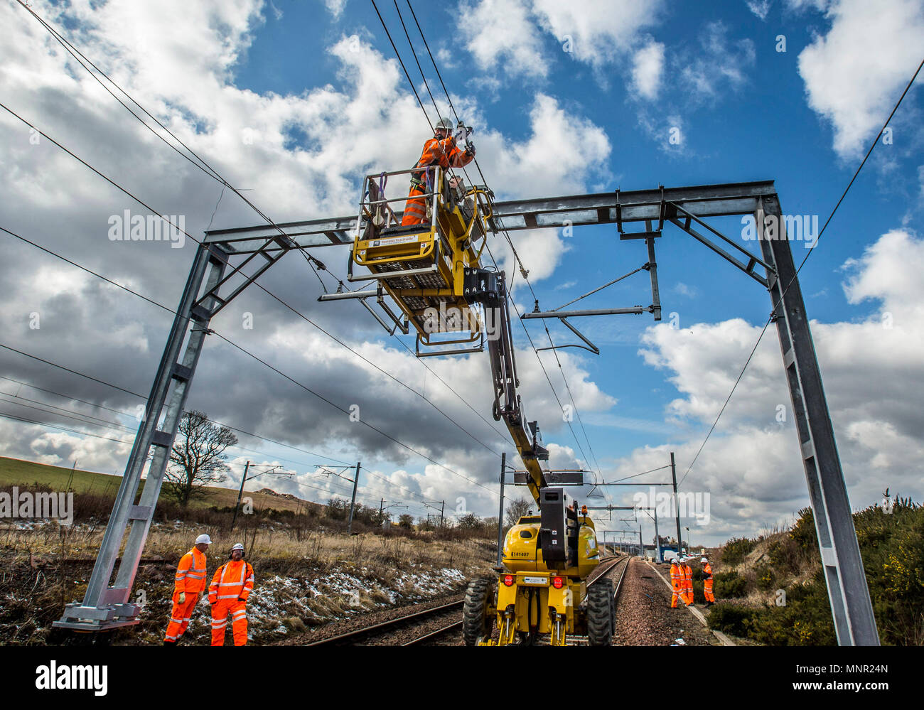 Railway workers working on overhead lines Stock Photo Alamy