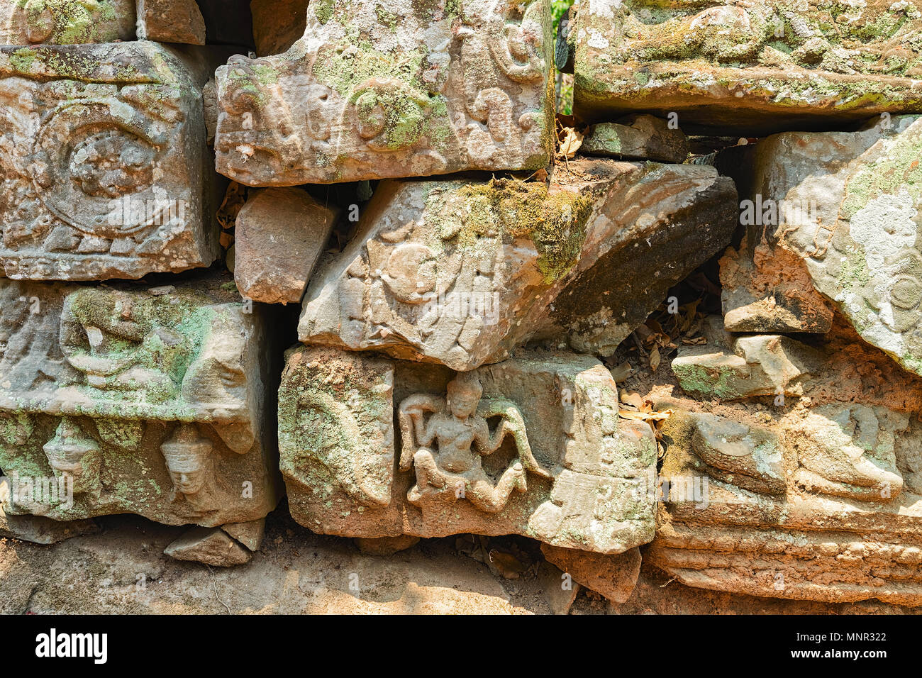 Carved decorations on stones in Banteay Kdei temple complex, Siem Reap, in Cambodia. Stock Photo