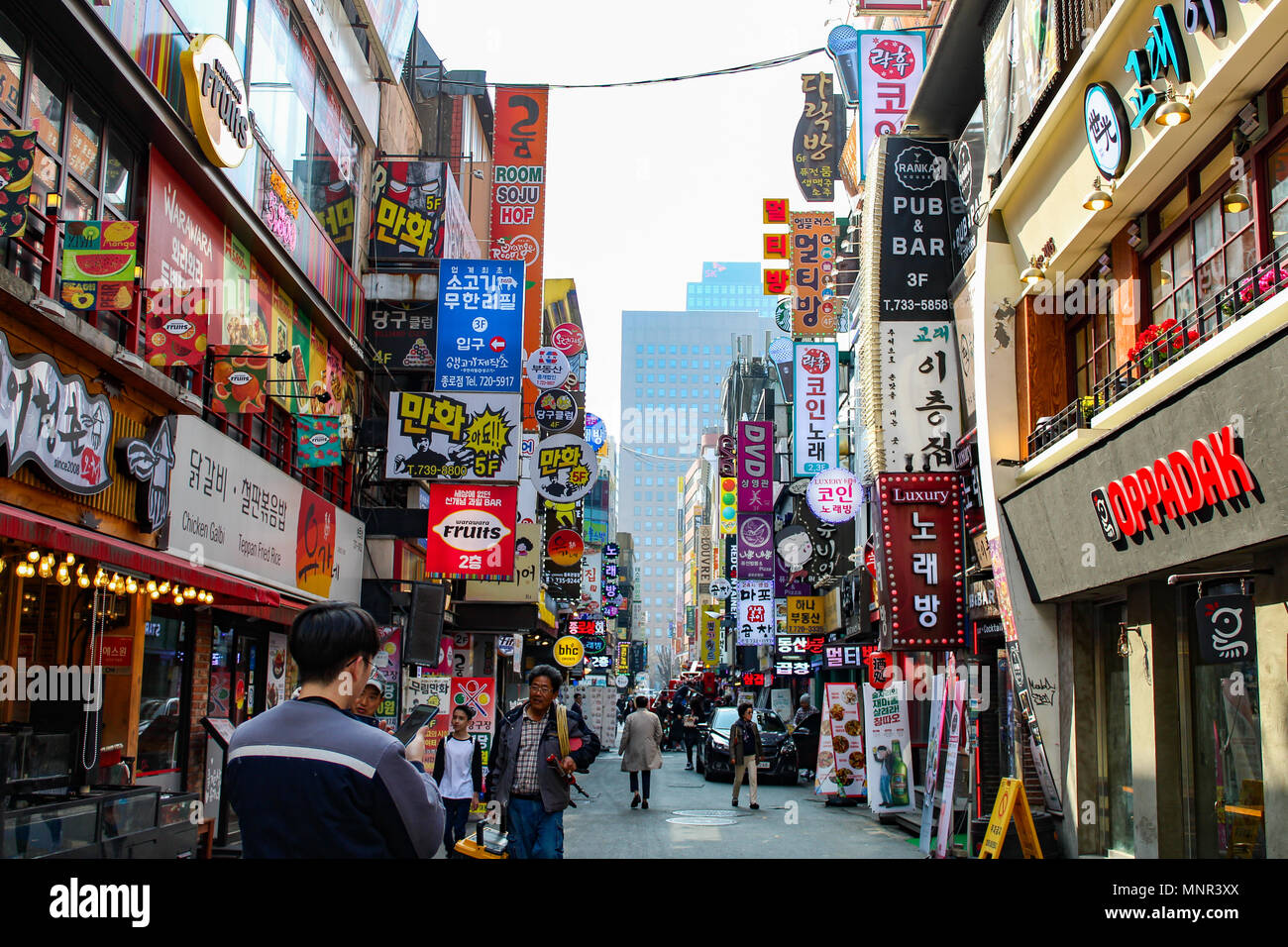 Street of Seoul, Korea with many shop signs and restaurants Stock Photo