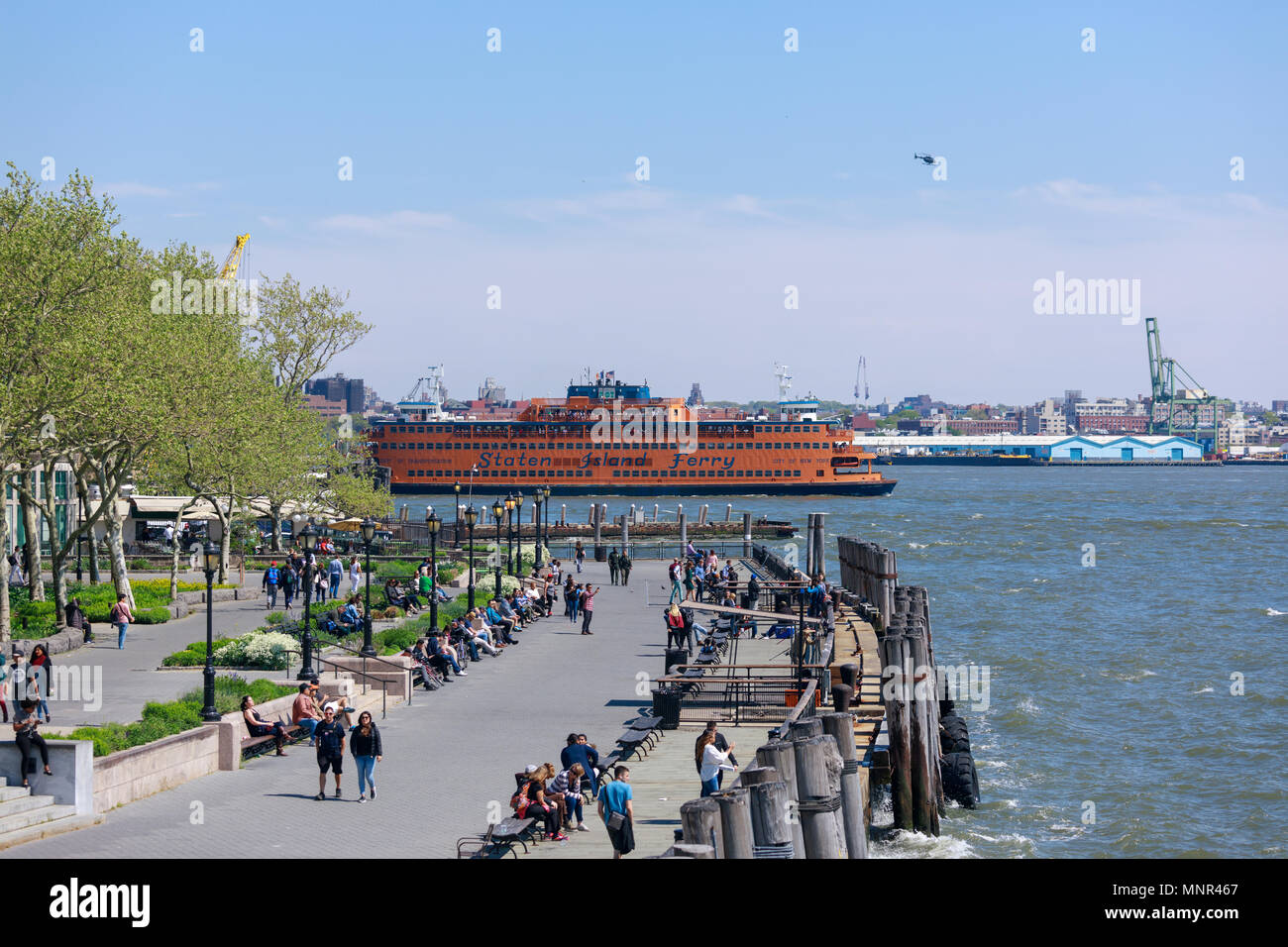 New York, USA - May 9, 2018 : The massive Staten Island Ferry departs from Battery Park in New York City. It is a free rides that offers great views o Stock Photo