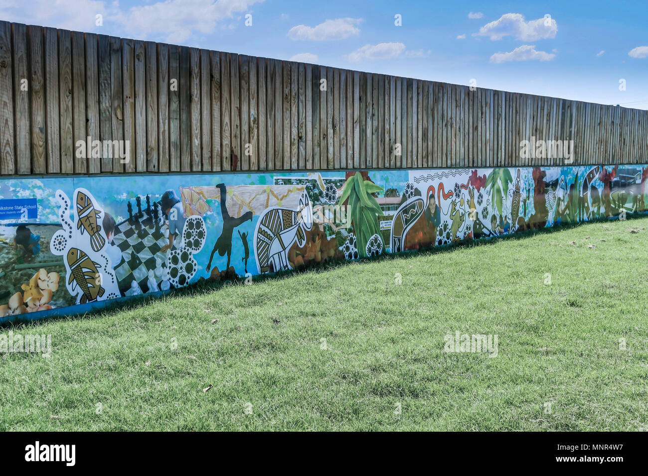 The graffiti wall has an Aboriginal theme and a traditional style of art Stock Photo