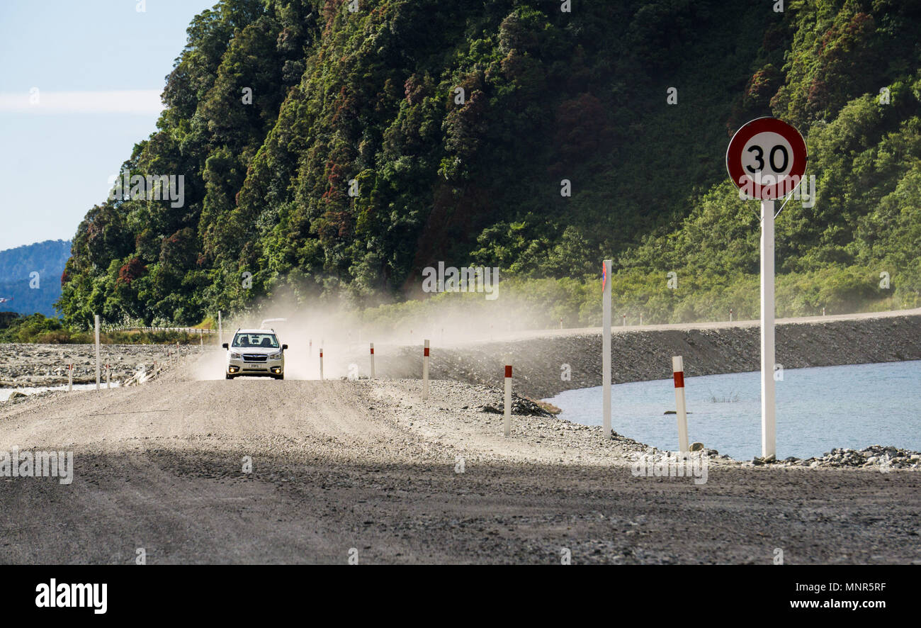 A car driving to the Fox Glacier in South Island, New Zealand Stock Photo