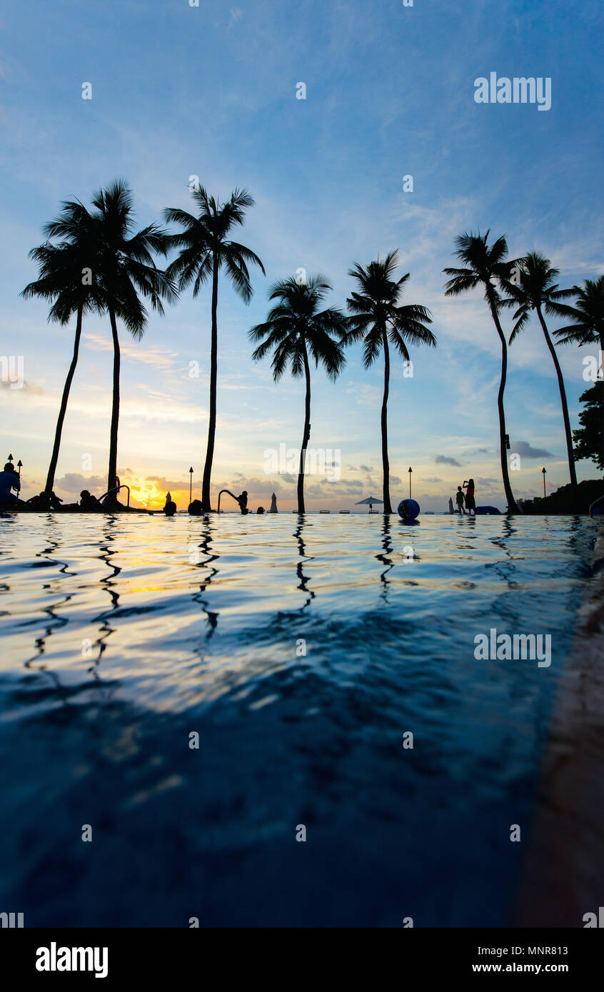 Beautiful sunset on tropical beach with palm silhouettes Stock Photo ...