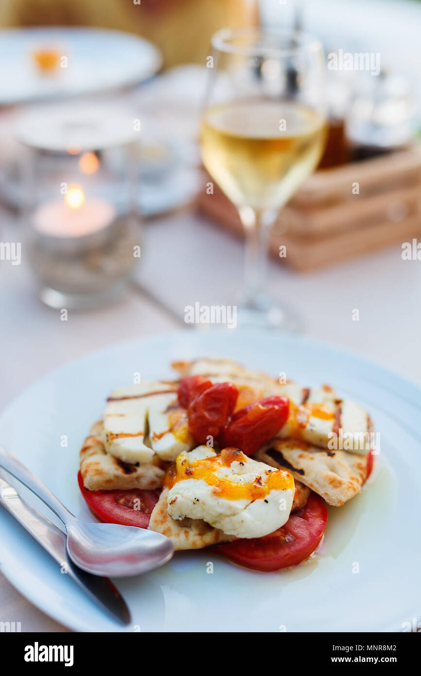 Close up of delicious hallumi cheese appetizer served for lunch or dinner Stock Photo
