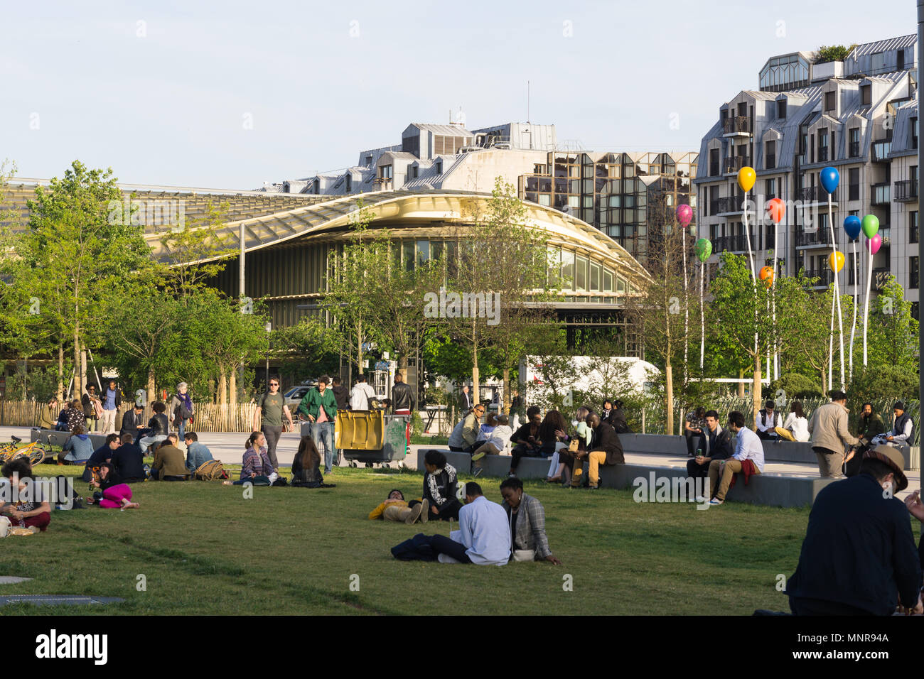 People relaxing in a park in Les Halles area in central Paris, France. Stock Photo