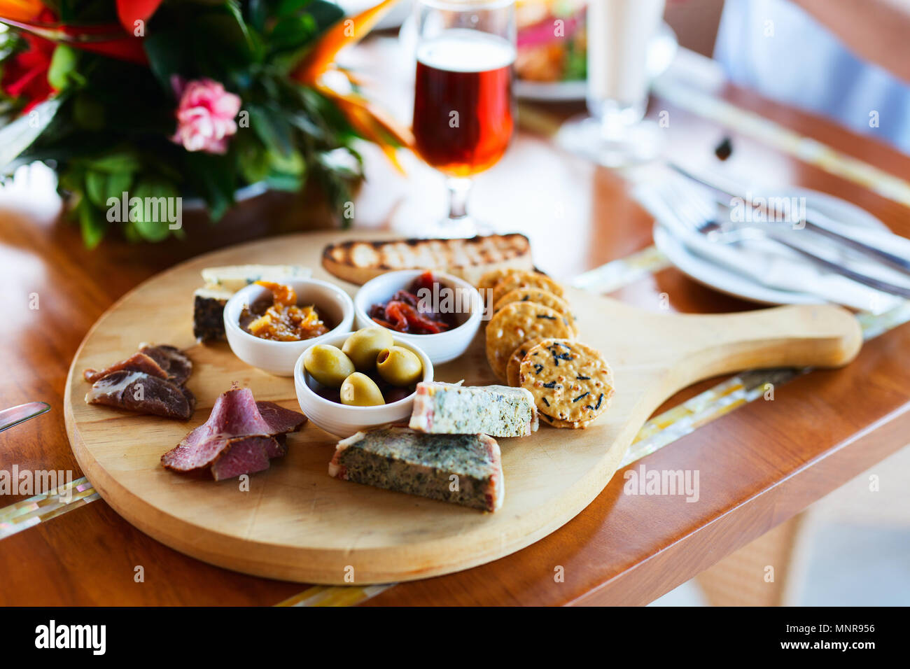 Selection of different delicious appetizers on beer platter Stock Photo