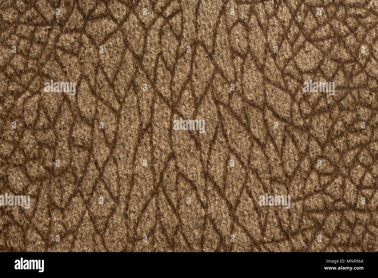 Elegant brown fabric texture with ornamental surface. Stock Photo