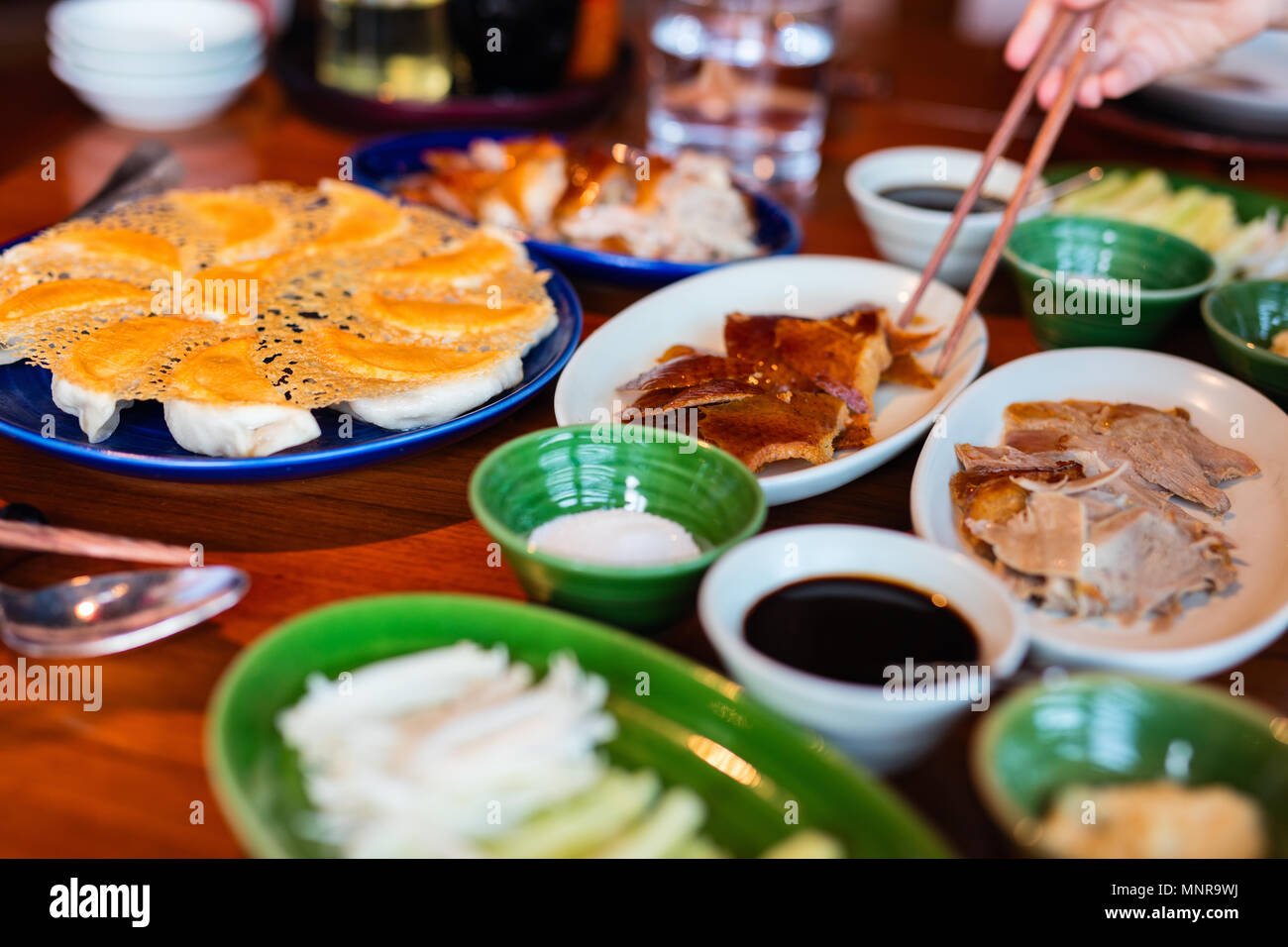 Peking Duck - Chinese roast duck served with pancakes, cucumber, spring