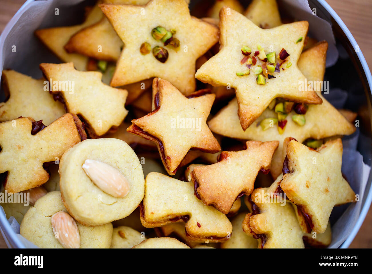 freshly baked homemade christmas cookies in a tin box wooden background - Homemade Christmas Cookies freshly baked homemade christmas cookies in a tin box wooden background - Homemade Christmas Cookies