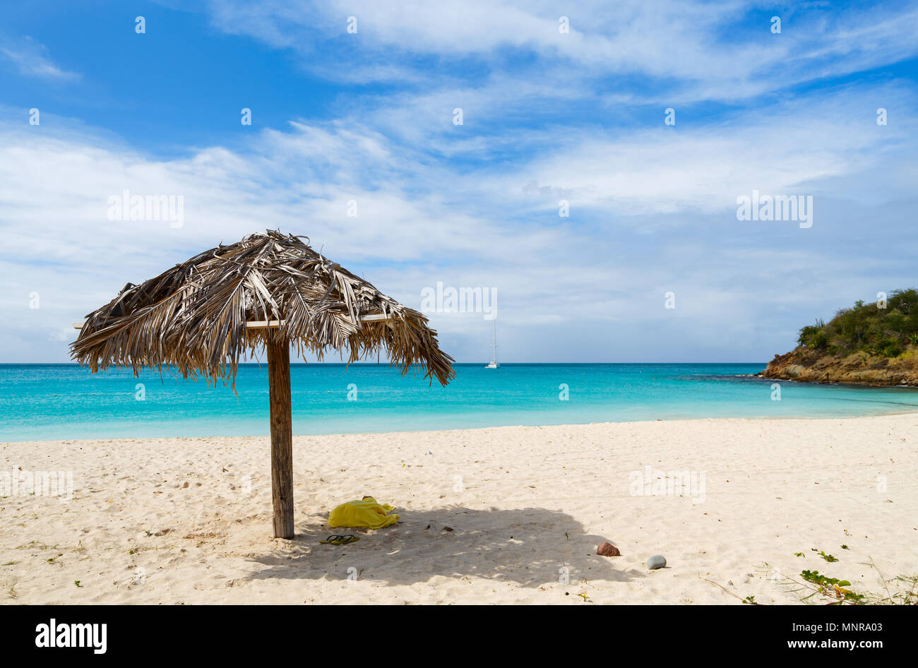 Idyllic tropical Ffryes beach with white sand, turquoise ocean water