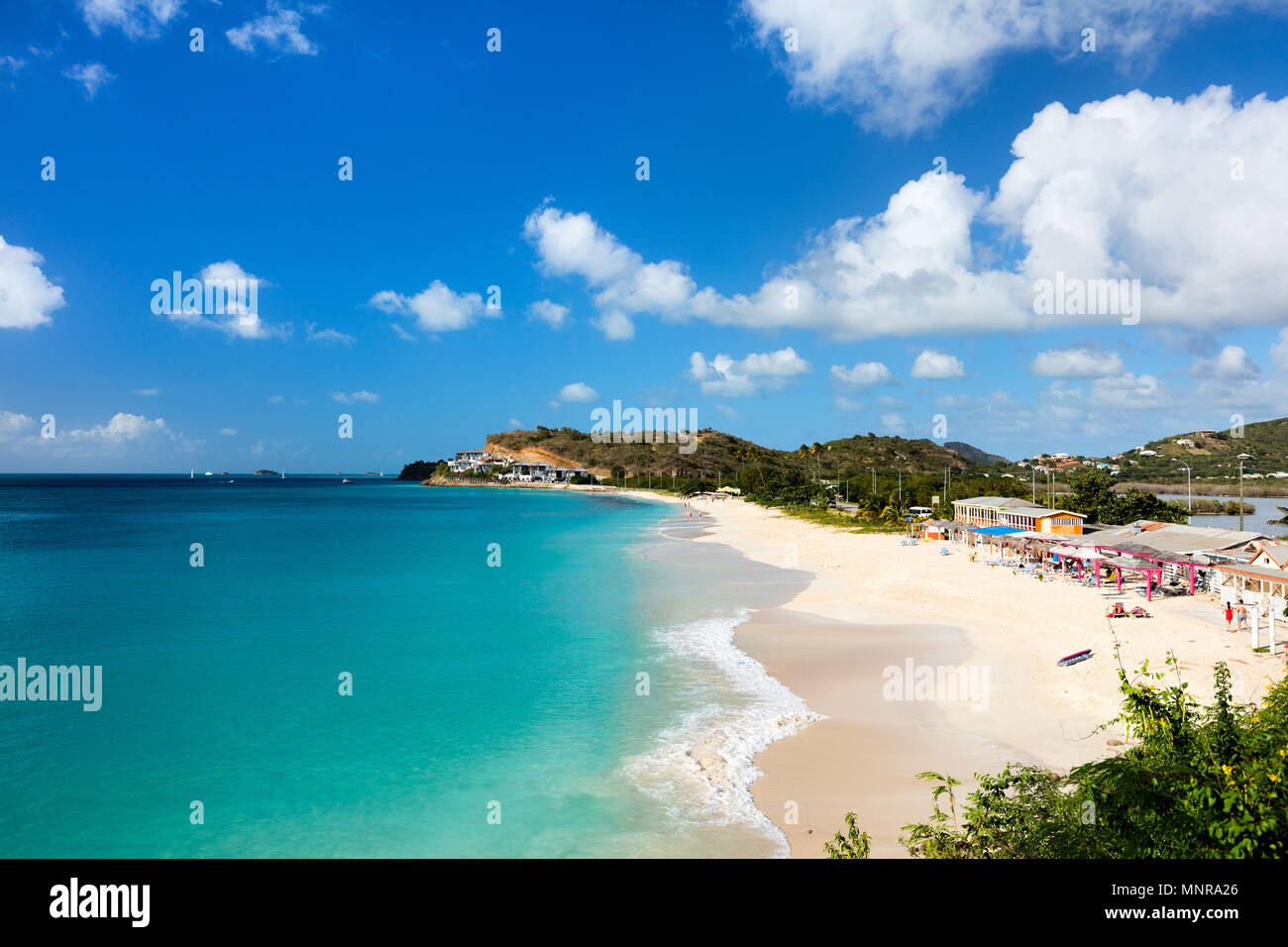 Idyllic tropical Darkwood beach at Antigua island in Caribbean with white sand, turquoise ocean water and blue sky Stock Photo