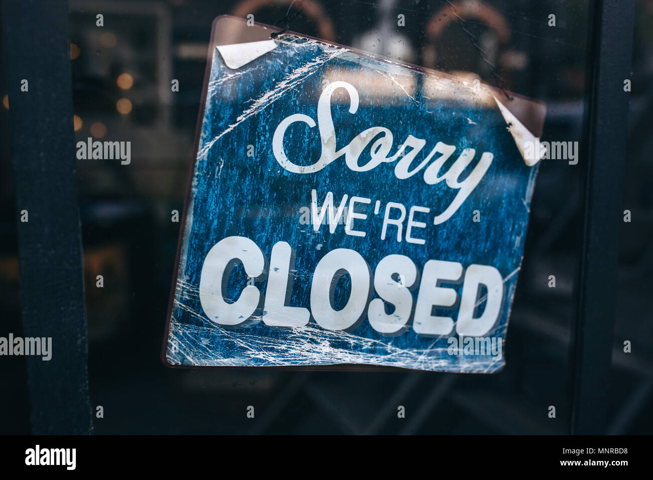 Inscription on a door: Sorry we are closed. Conceptual photo or table ...