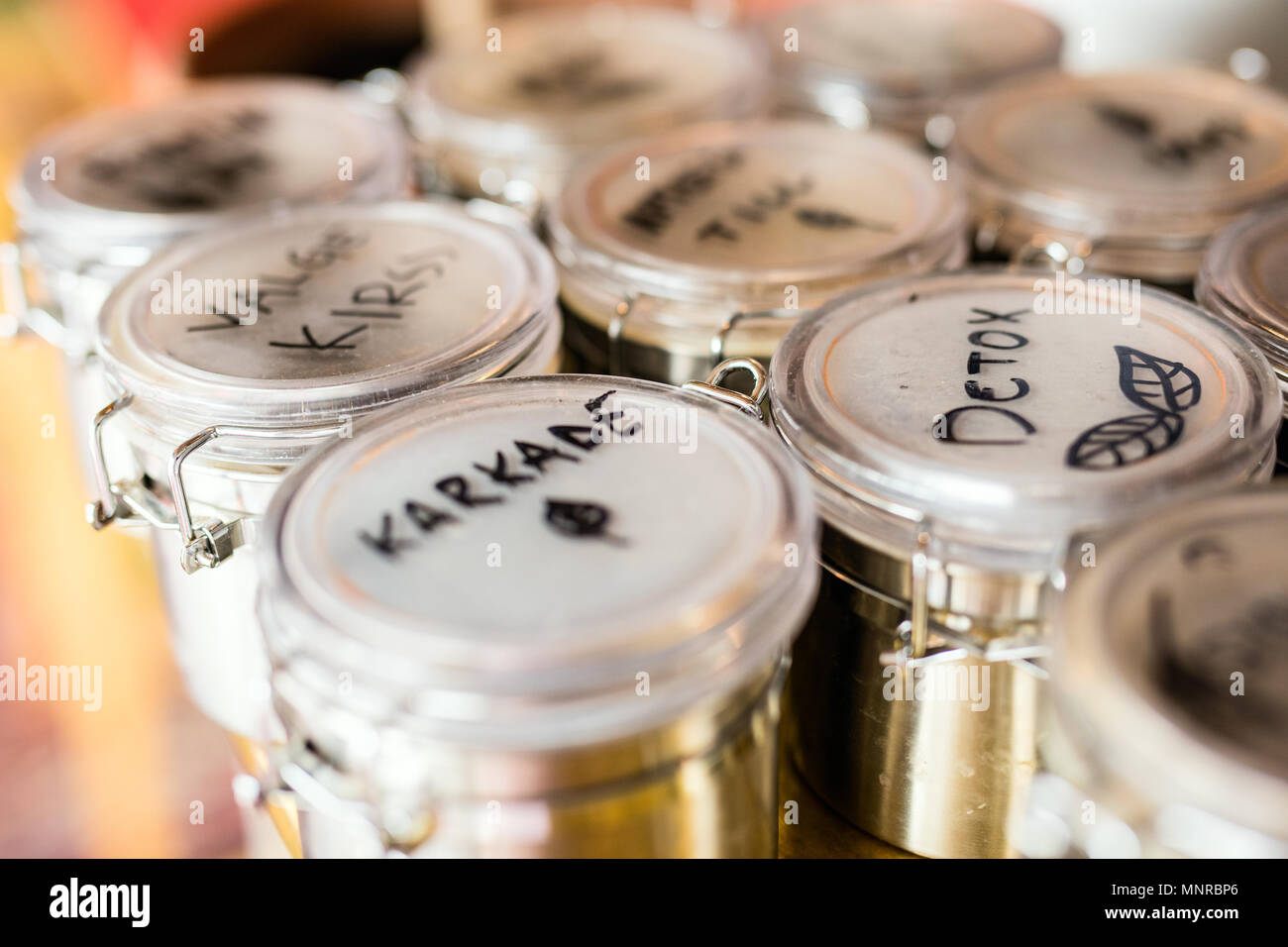 Herbal green teas in smal metal containers Stock Photo