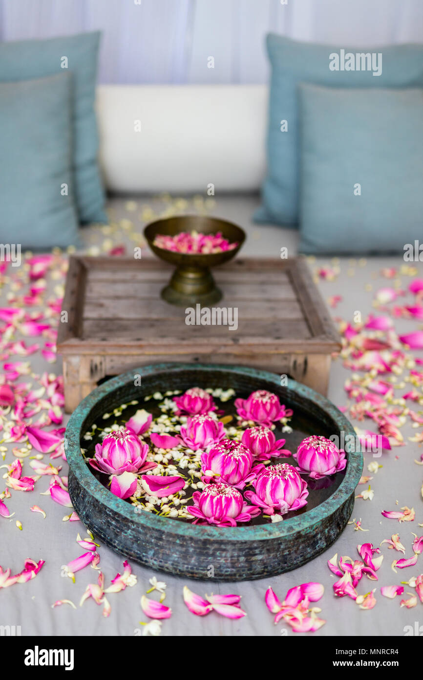 Romantic beach cabana decorated with lotus flowers Stock Photo