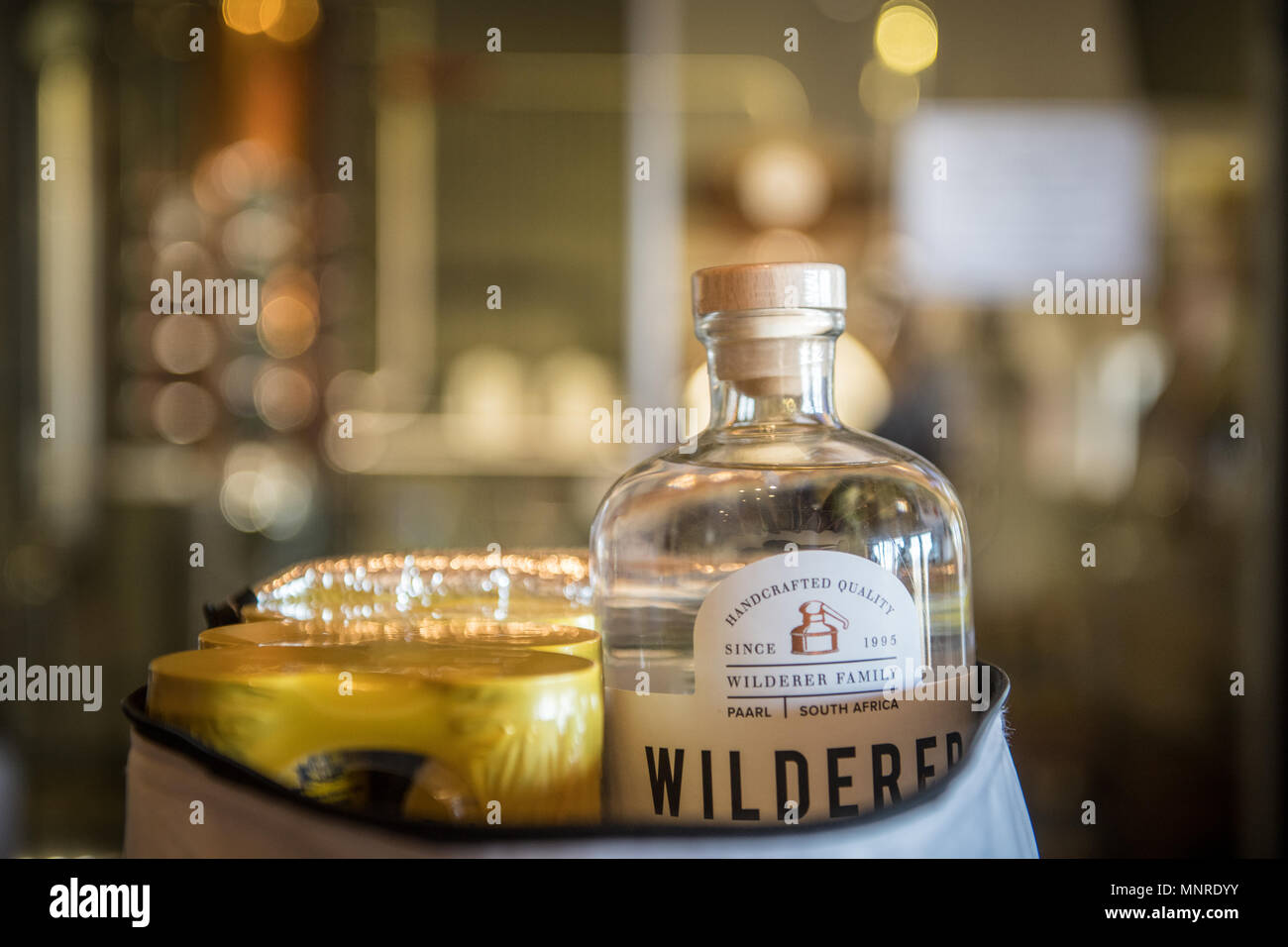 Bottle of handcrafted Gin tucked into bag, Cape Town, South Africa