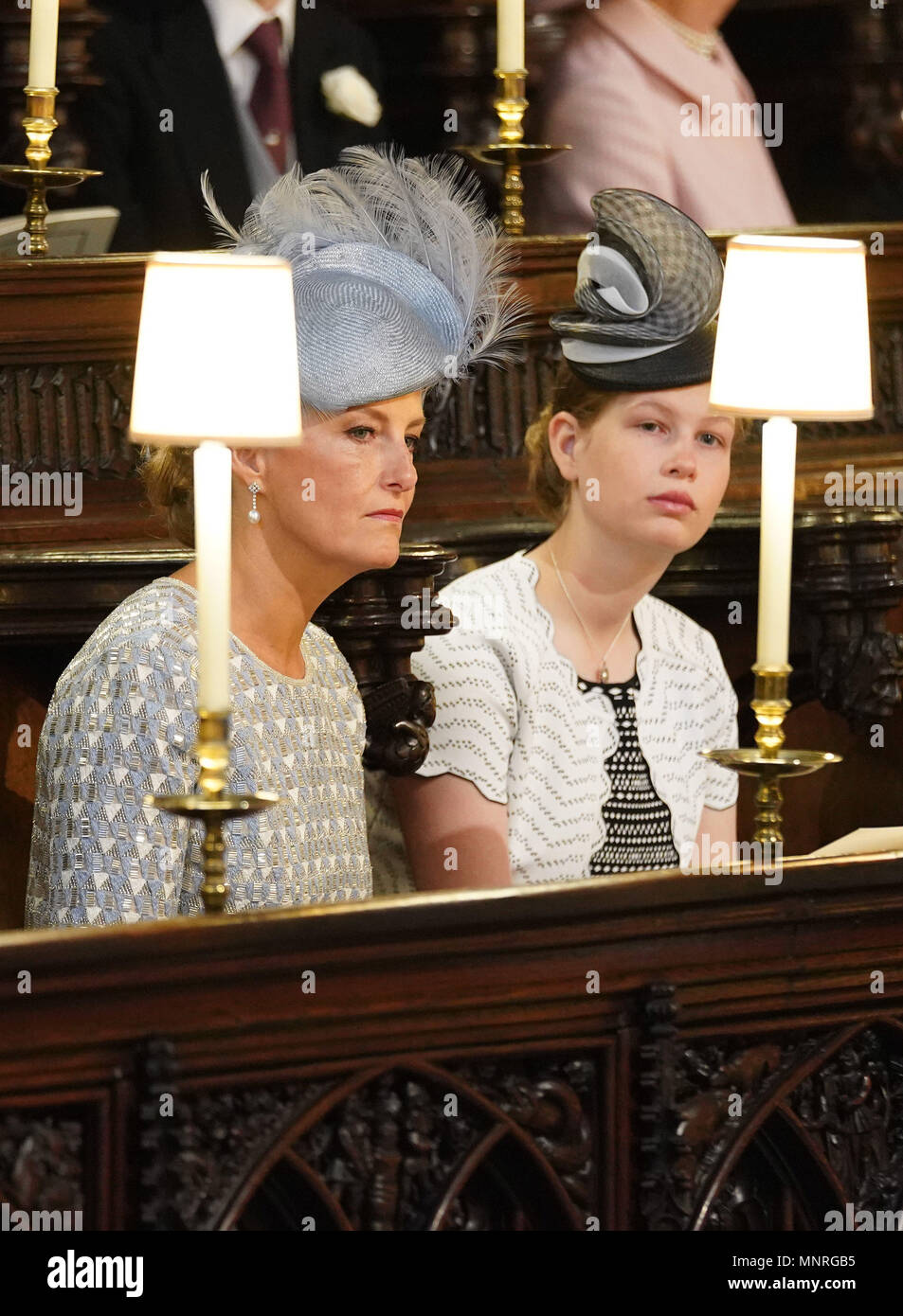 The Countess of Wessex and Lady Louise Windsor sitting in St George's Chapel at Windsor Castle ahead of the wedding of Prince Harry and Meghan Markle. Stock Photo