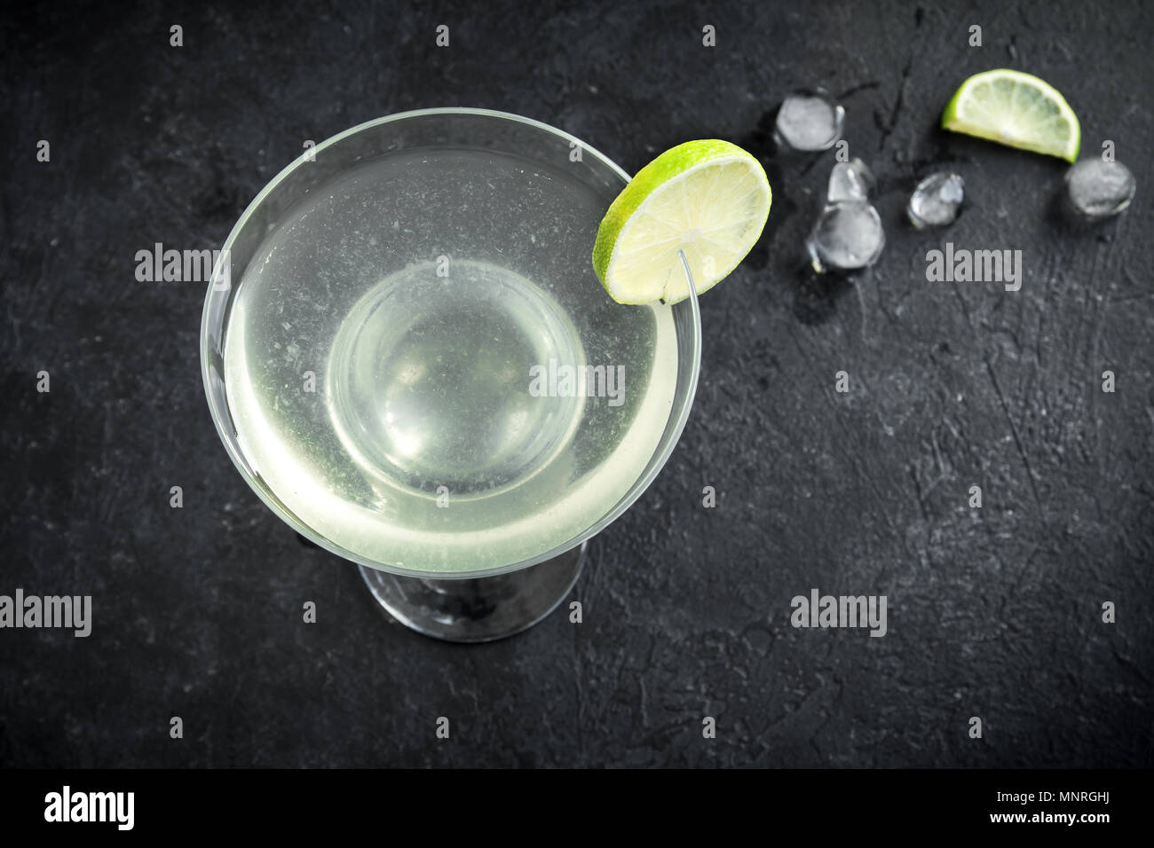Gimlet Cocktail. Alcoholic Lime and Gin Gimlet on black background